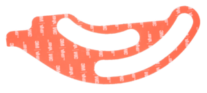 Die cut component with red 3M backing liner