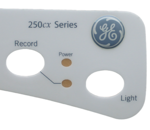 GE overlay with doming, domed resin over the logo